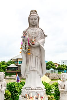Statue of Guanyin goddess of Mercy. Buddha Chinese art.