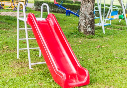 A colorful playground in a park.