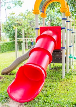 A colorful playground in a park.