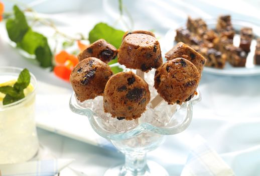 Cute sweet muesli dessert baked in the shape of popsicles ready to serve.