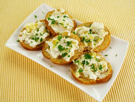 Pineapple ricotta with parsley spread on toast.