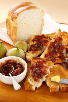 Rustic homemade fig jam sandwiches on toast ready to serve.