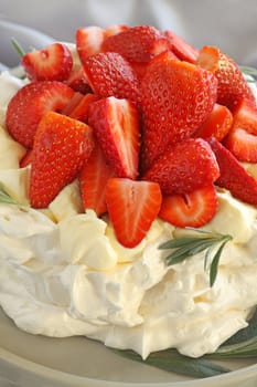 Delicious traditional Australian strawberry pavlova made from meringue and cream.