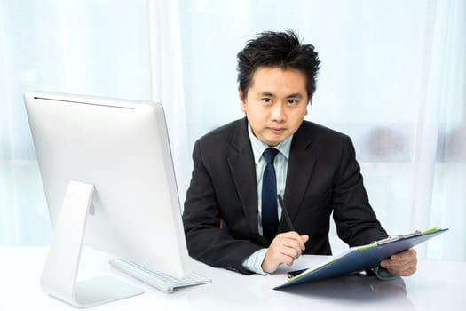 businessman working with desktop computer