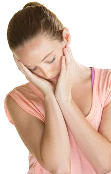 Lonely Caucasian woman holding her face in her hands