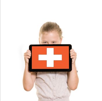 flag of Switzerland displayed on tablet computer held by young girl