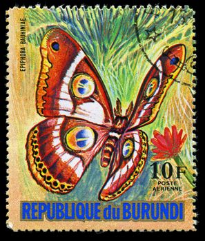 REPUBLIC OF BURUNDI - CIRCA 1974: A stamp printed in Burundi shows a butterfly Epiphora Bauhiniae, series, circa 1974