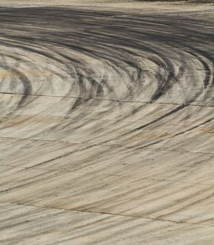 Background with tire marks on road track