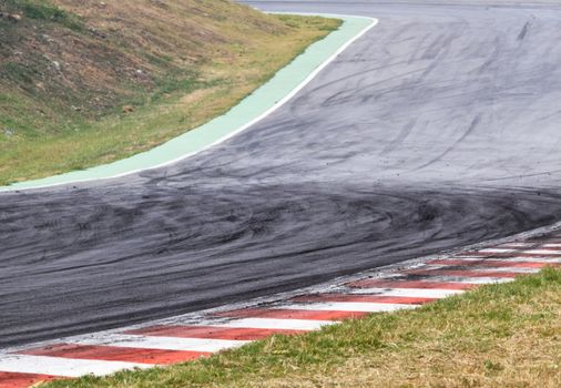 Background with tire marks on road track