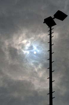 Sports club floodlight pylon in silhouette