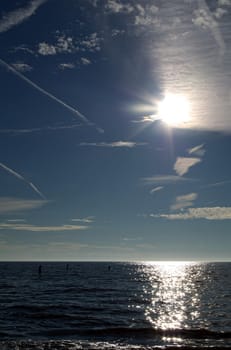 Sun creates sparkles on the sea below