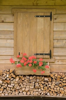 Wood balcony in a chalet in dolomites mountain