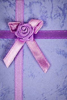 Pink gift ribbon and bow on present