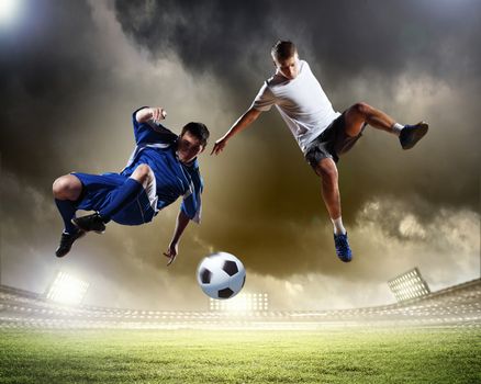 Image of two football players at stadium