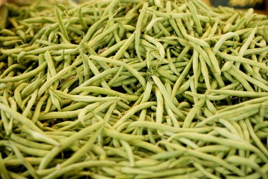 Large pile of french beans on the local market