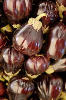 Closeup of eggplants on vegetable market