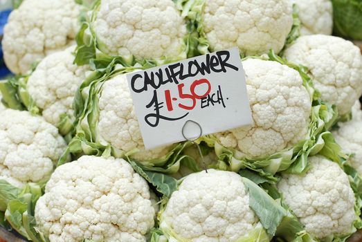 Fresh cauliflowers for sale priced at 1.50 euro each