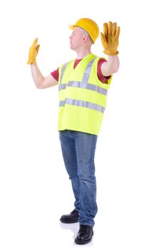 Construction worker gesturing stop for traffic to pass isolated on white