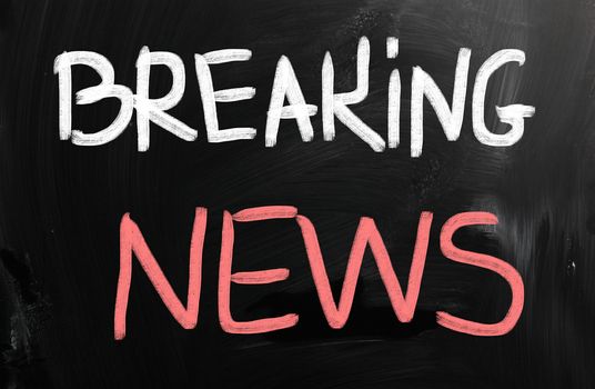 News handwritten with chalk on a blackboard