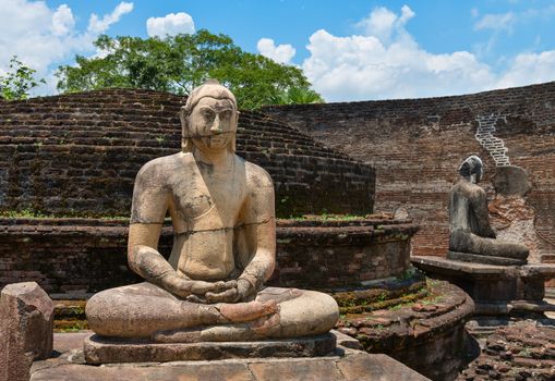 Ancient Buddha statue of temple ruins in ancient city of Polonnaruwa, Sri Lanka 