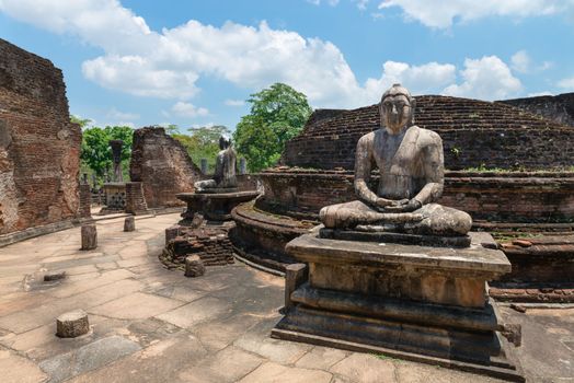 Ancient Buddha statue of temple ruins in ancient city of Polonnaruwa, Sri Lanka 