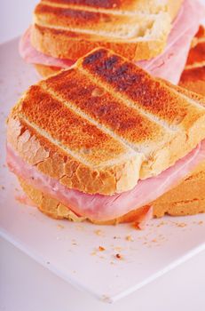 Close up of a toast over a white plate