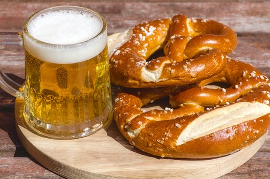 Oktoberfest Beer Mug and traditional German pretzels