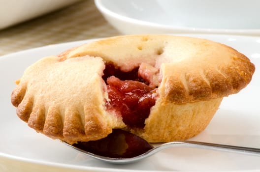 pie with berries on a plate.