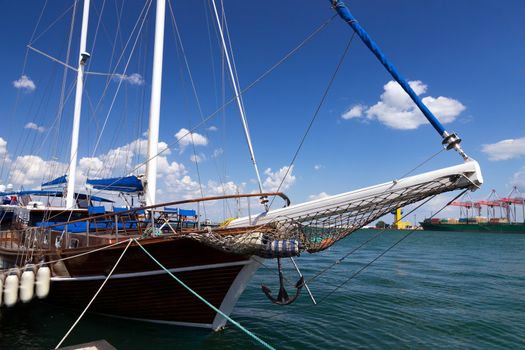 Sail Boat anchor in port - summer travel