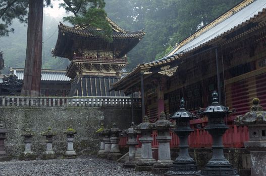 wet rainy atmosphere at the place of famous Toshogu Shrine in Nikko, Japan