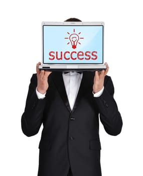 businessman holding laptop with success symbol