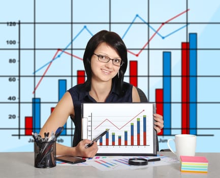 businesswoman with clipboard sitting in office