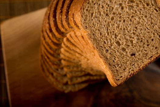 Sliced bread vertical arrangement on a cutting board