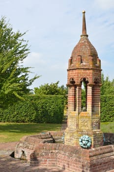 Ornate water feature in classical garden