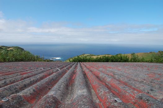 coast of flores island in azores, Portugal - view from above the roof