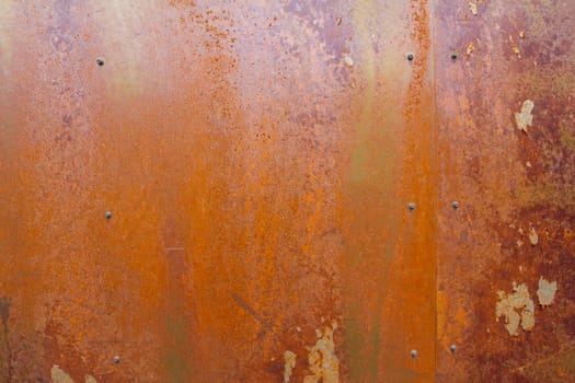 A rusty wall is photographed to create this texture background with copy space for design.