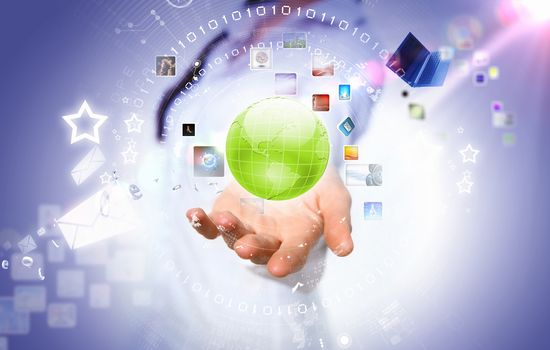 Woman holding illustration of globe in hand. Media technologies