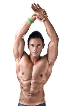 Attractive muscular young man with arms stretched up, isolated on white background