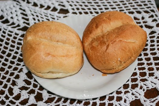 Crusty round roll made from wheat flour, barm, malt, water and salt