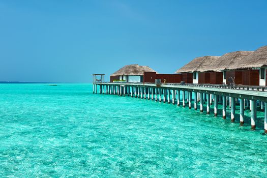 Beautiful beach with water bungalows at Maldives