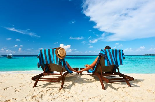 Couple on a tropical beach at Maldives