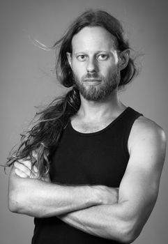 Black and white portrait of a serious man.