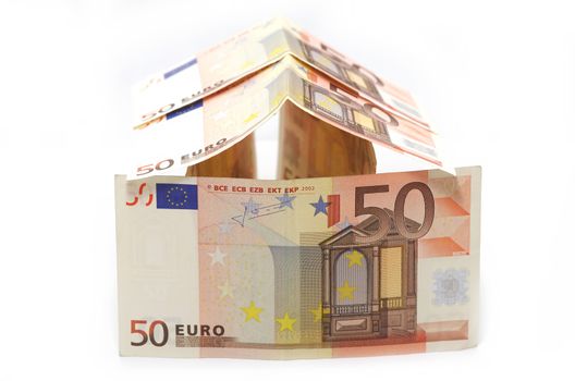Money (euro) house on a white background