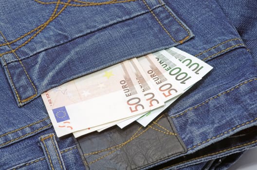 Money (euro banknotes) in a jeans pocket