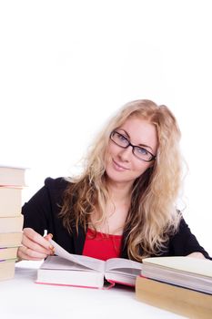 Pretty student girl with pile of books isolated on white