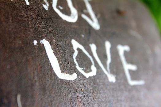 love text painted on bench