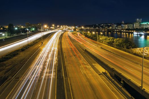 Interstate Freeway Light Trails Through Portland Oregon City Along Willamette River at Night