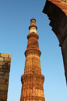 qutub minar with other walls