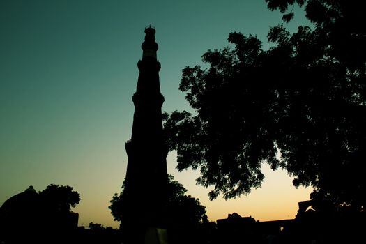qutub minar silhouette in retro color