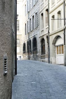 Street with stones in old city of Geneva, Switzerland